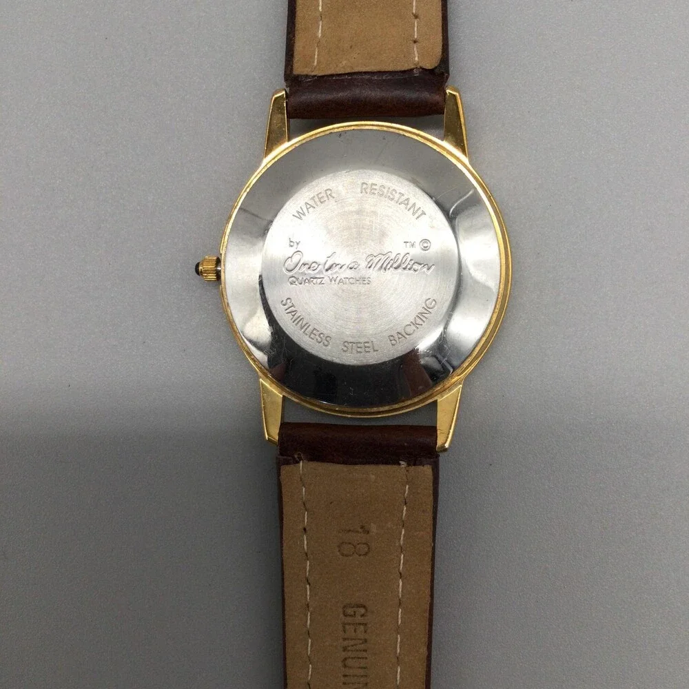 One In A Million Mens Watch 34mm Don't Look Back Gold Tone Leather New Battery